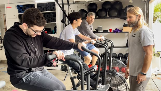 C9 Jack and Fudge on exercise bikes